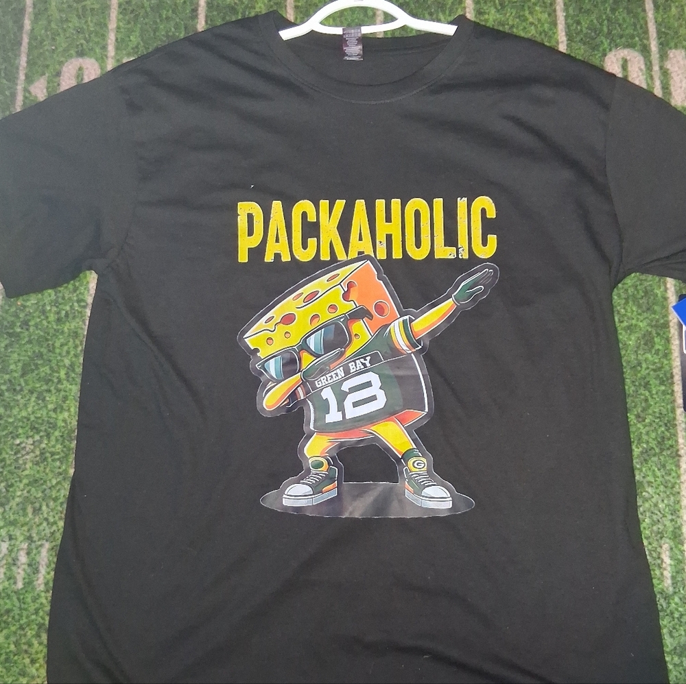 Sportsaholics PACKAHOLIC Black short sleeve tee with 'Packaholic' graphic. Featu